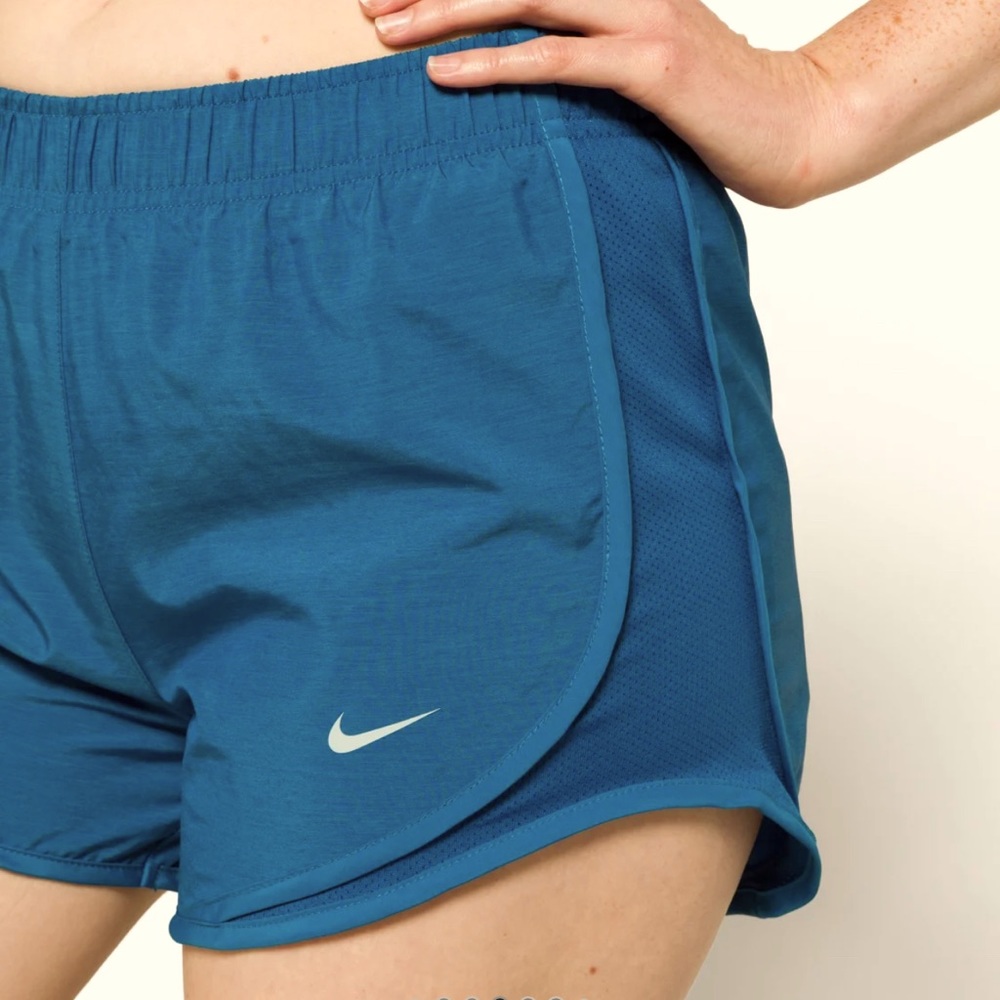 Nike tempo running short, blue, like new condition. Size large.